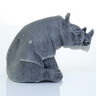 Носорог сидящий